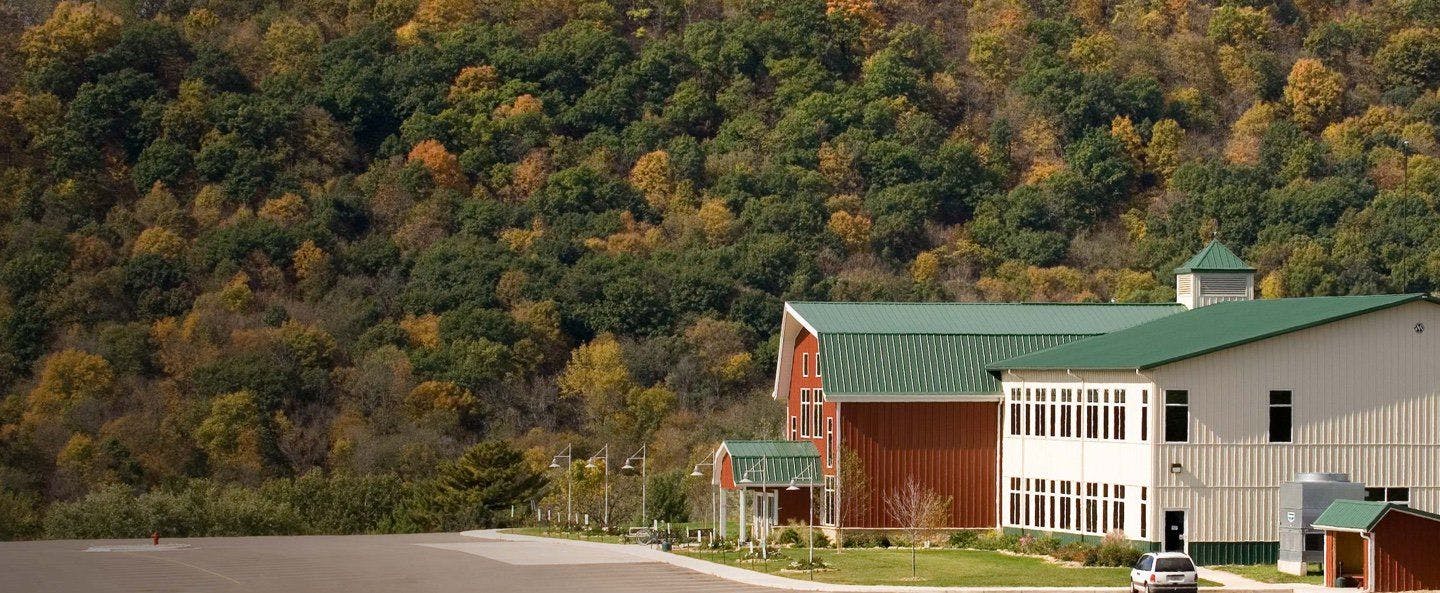 Organic Valley headquarters building surrounded by trees.