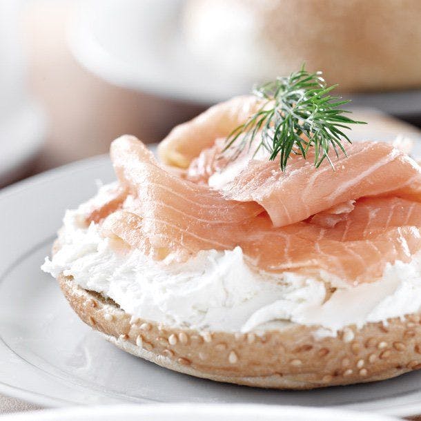 A bagel with cream cheese and salmon.